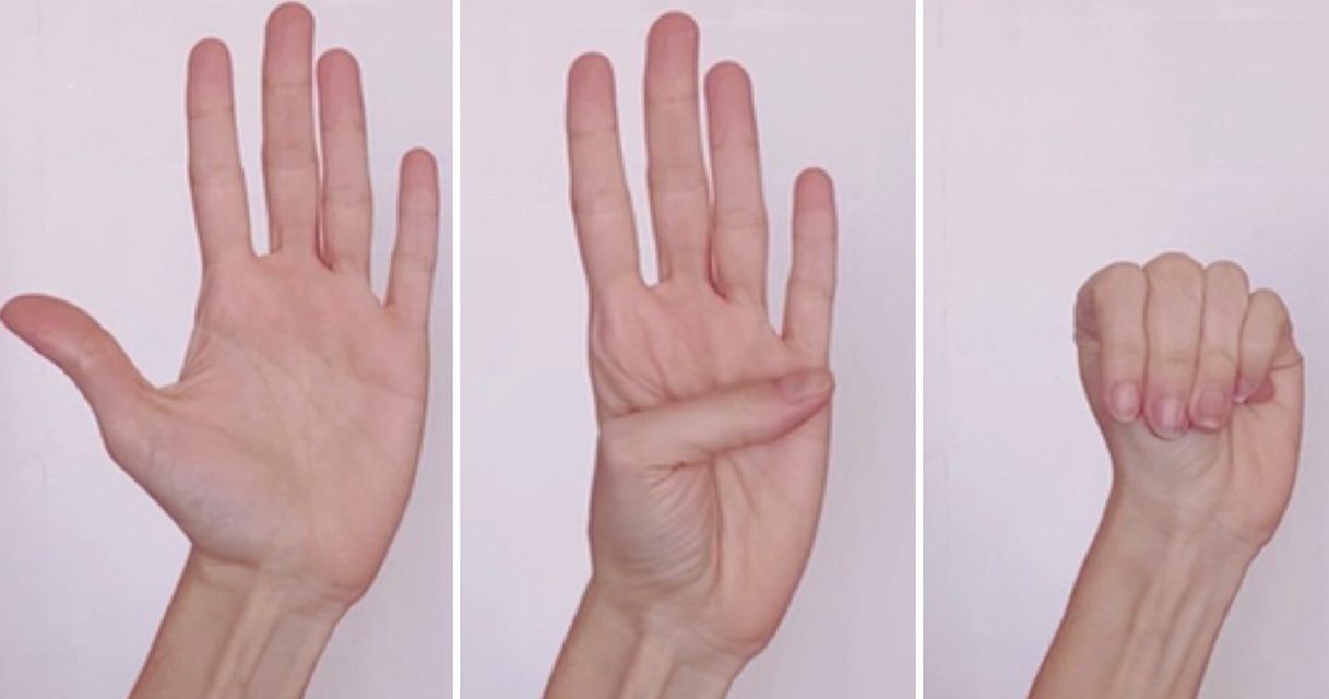 Violenza, un silenzioso segnale con la mano per comunicare un pericolo o richiesta di aiuto